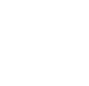 A magnifying glass over a sheet of paper.